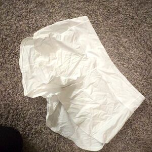 White Lululemon Like New speed up shorts.